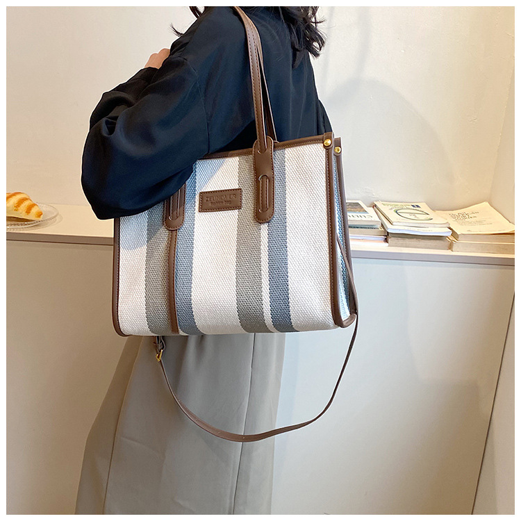 Nowa torba z grubej bawełny o dużej pojemności płócienna torba damska transgraniczny handel zagraniczny kontrastowy kolorowy pasek torba na ramię trend w modzie torba listonoszka_voghion.com