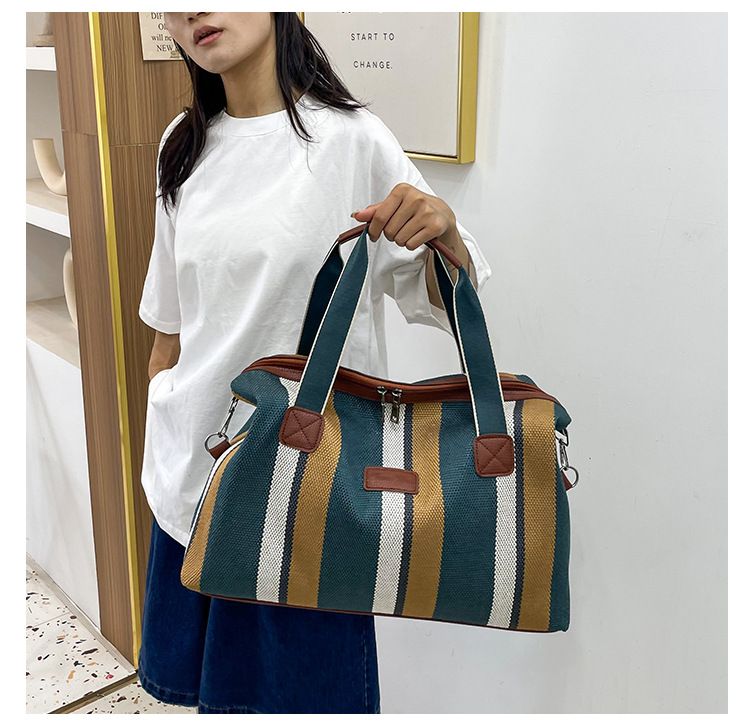Reisetaschen Neue gestreifte Kurzstrecken-Reisetasche für Damen aus rauem Canvas, Handgepäcktasche, große Kapazität, Schulter-Umhängetasche_voghion.com