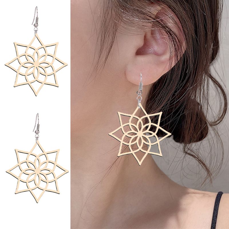 Orecchini a margherita cavi in legno con motivo a colori primari, stile semplice europeo e americano, orecchini di fabbrica per il commercio estero_voghion.com