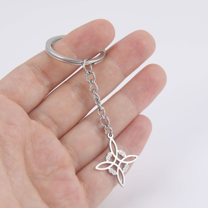 Het hete verkopende titanium stalen sleutelhanger vierkante doorlopende krullende patroon hanger gemaakt van 304 materiaal roestvrij staal sleutelhanger vakantiecadeau voor koppels_voghion.com