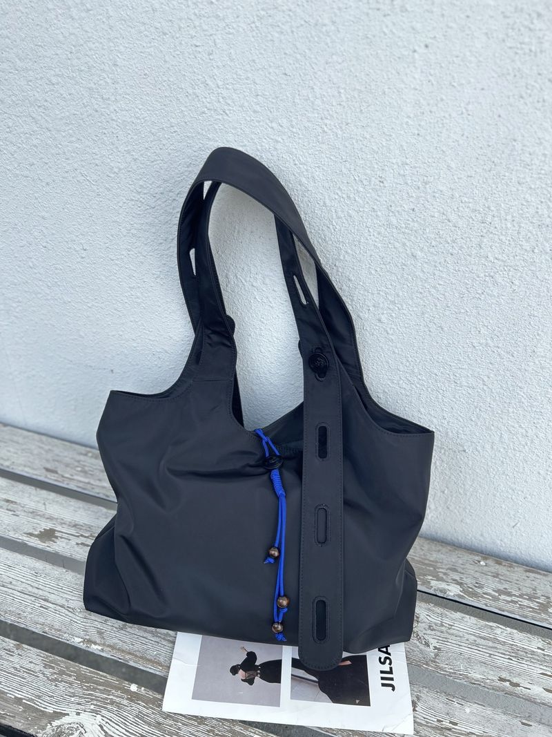 Borsa tote portatile per esterni, borsa intrecciata, fibbia in corda, semplice, impermeabile, comoda per lo shopping, nuova moda autunno e inverno 2025, versatile, quotidiana_voghion.com