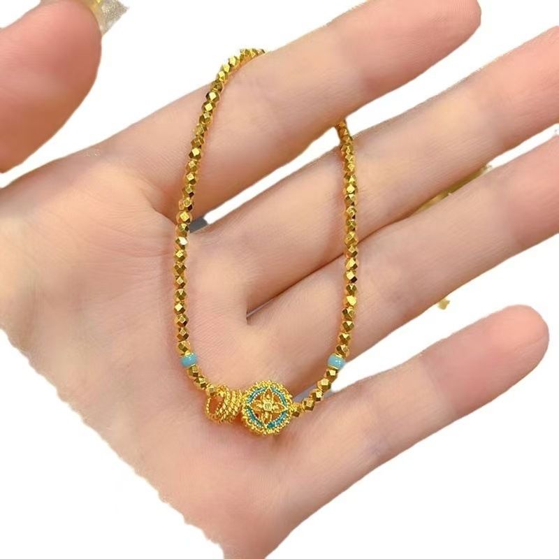 2024 New Gold Disco Beads Enamel Hollow Clover Light Luxury Fashion High-end Bracelet Jewelry_voghion.com