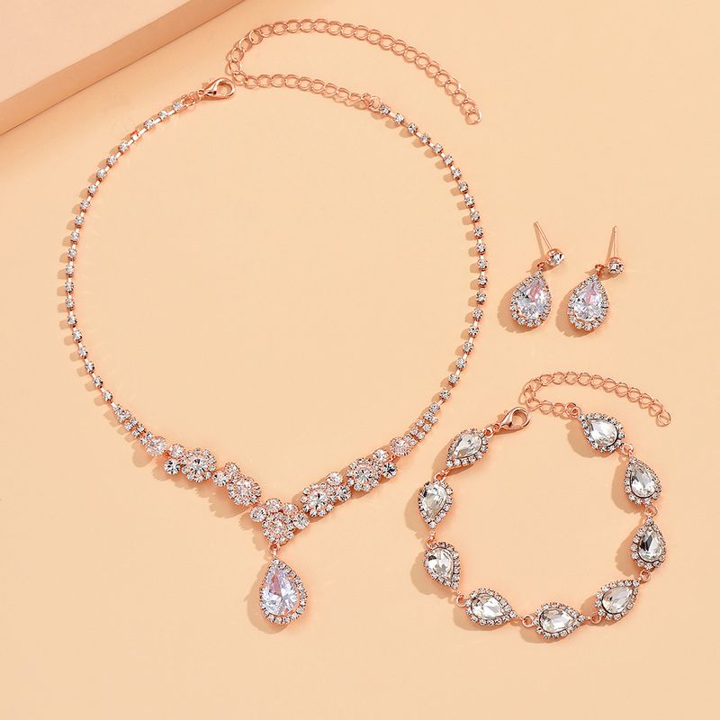 Set di gioielli da donna, alla moda, nuovo, alla moda, in oro rosa, tre pezzi, collana, orecchini, bracciale con zirconi, set da sposa._voghion.com
