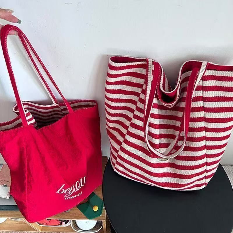 Borsa a tracolla casual grande capacità per studentessa, stile coreano, in tela a righe estive 2025, per donna_voghion.com
