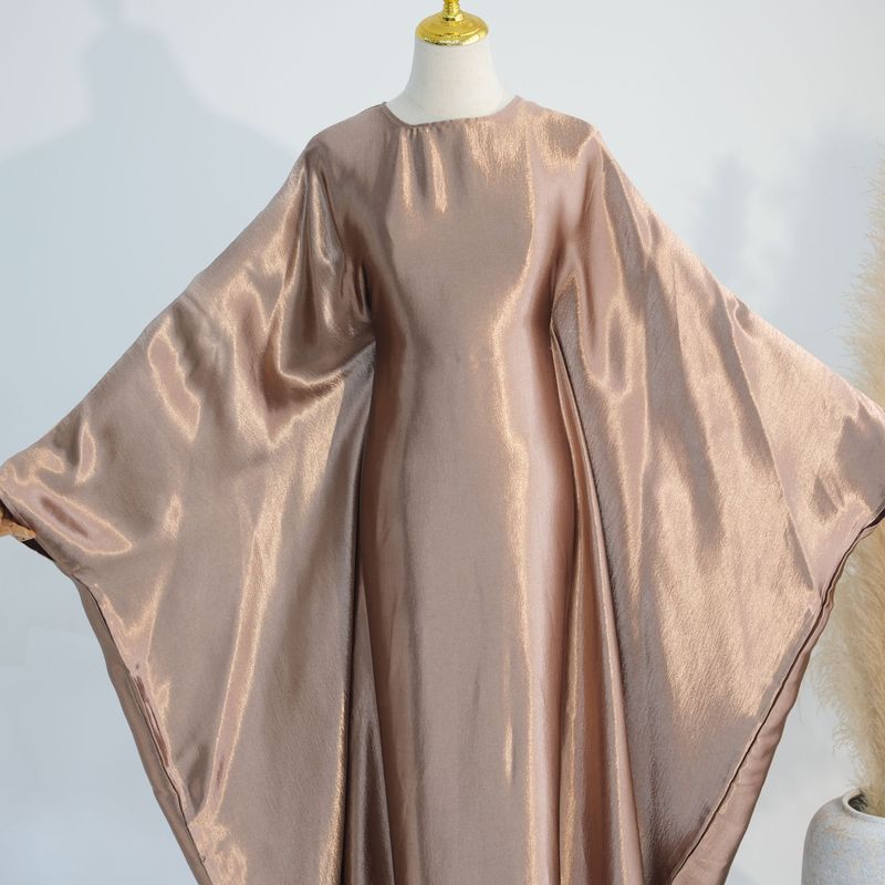 Dámské oblečení blízkovýchodní lesklé šaty abaya_voghion.com