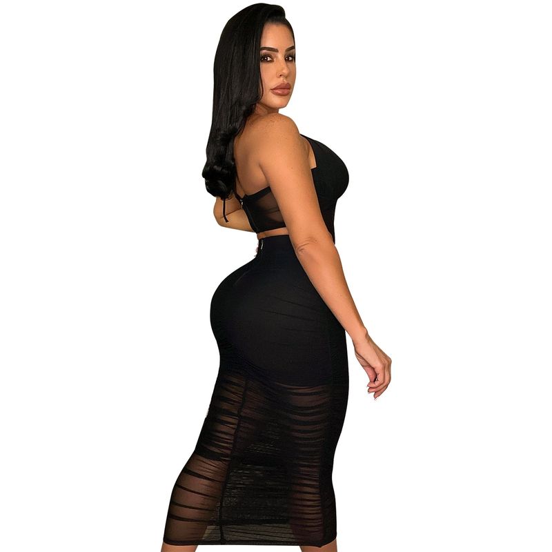 Abbigliamento da donna. Completo gonna a due pezzi monopezzo trasparente in rete sexy_voghion.com