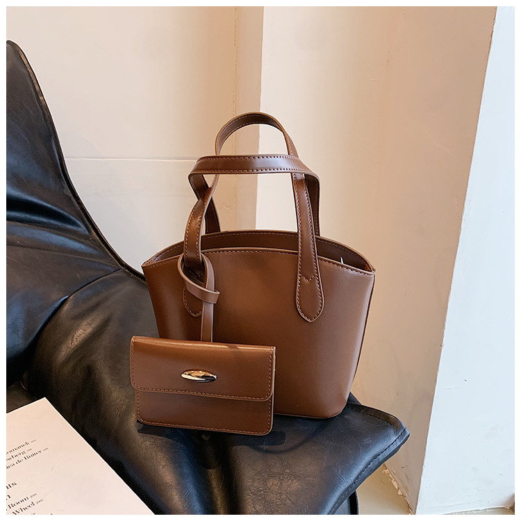 Borsa piccola portatile di moda estiva nuova borsa a secchiello casual semplice da donna 2023 borsa per ascelle suocera con trama di nicchia_voghion.com