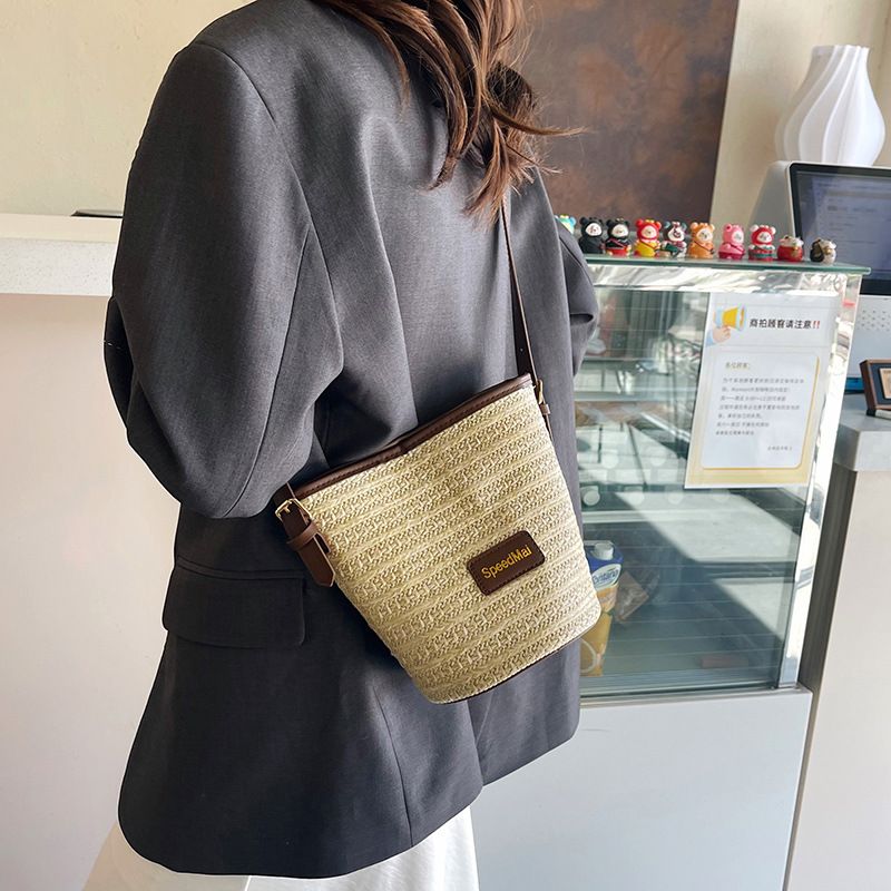 Borsa a secchiello testurizzata per le vacanze estive in spiaggia, carina, stile Mori, da donna, con tracolla singola, casual e intrecciata, nuova moda 2025_voghion.com