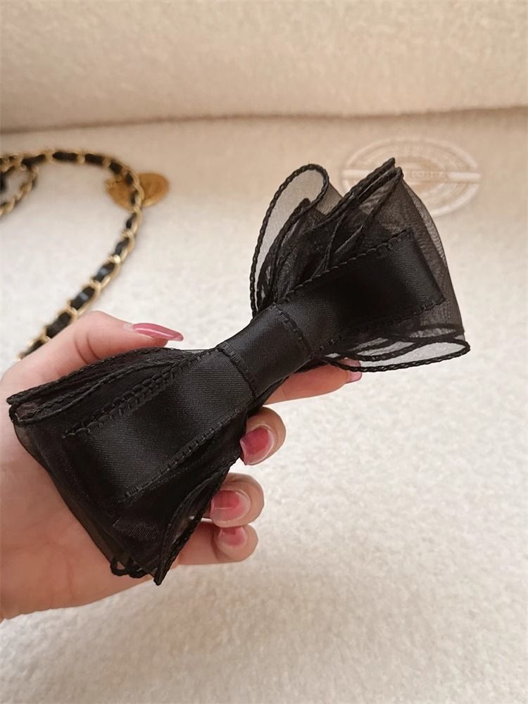 Versione coreana del copricapo a coda di cavallo alta con fiocco a doppia rete in stile principessa, 2025, nuovo e versatile._voghion.com