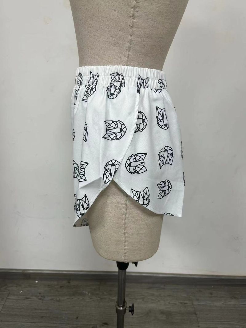Completo da casa da donna composto da top e pantaloncini con scollo a V, stampati e allacciati, stile ampio_voghion.com