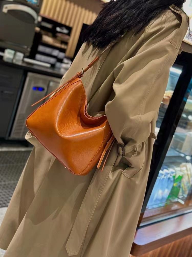 Borsa a tracolla versatile e capiente in pelle con design di nicchia, borsa da donna sotto l'ascella_voghion.com