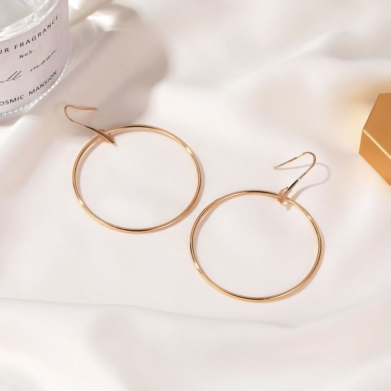 Nuevos pendientes geométricos de estilo frío con grandes círculos y pendientes colgantes de estilo extremadamente simple, pendientes de moda que combinan con todo_voghion.com