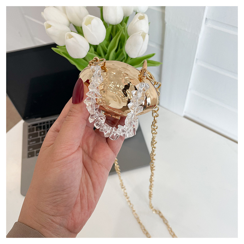 Mini 2024 Été Nouveau sac en coquille d'œuf en métal Sac de banquet de mode européenne et américaine Sac à bandoulière à bandoulière unique Sac pour femmes élégant_voghion.com