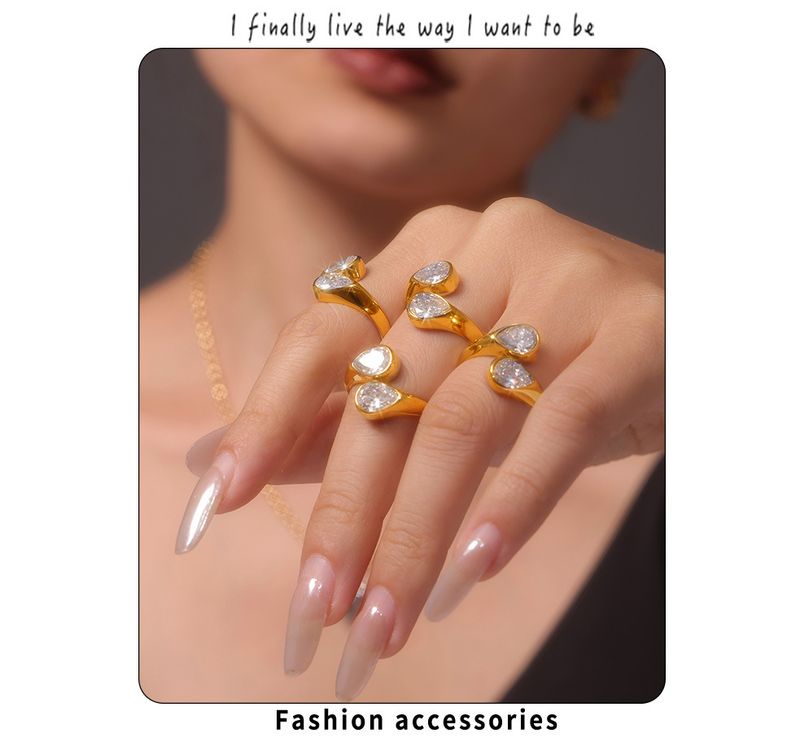 Anello aperto in acciaio al titanio con doppia goccia d'acqua in zircone 3A, galvanica PVD, punto di ritenzione del colore, all'ingrosso, da donna_voghion.com