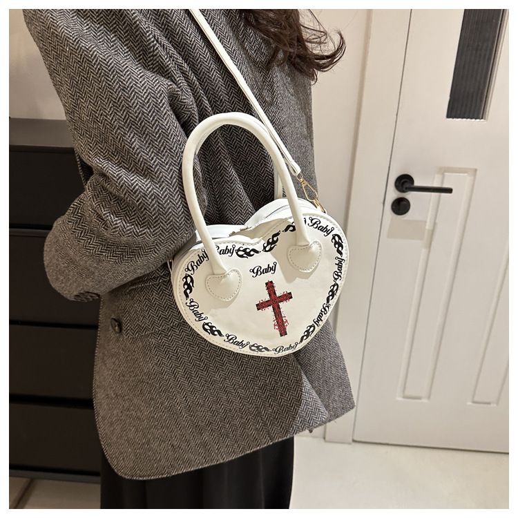 Borsa da donna personalizzata Rivet Punk Dark 2024 Nuova borsa a forma di cuore, borsa a tracolla incrociata, borsa a tracolla per donna_voghion.com