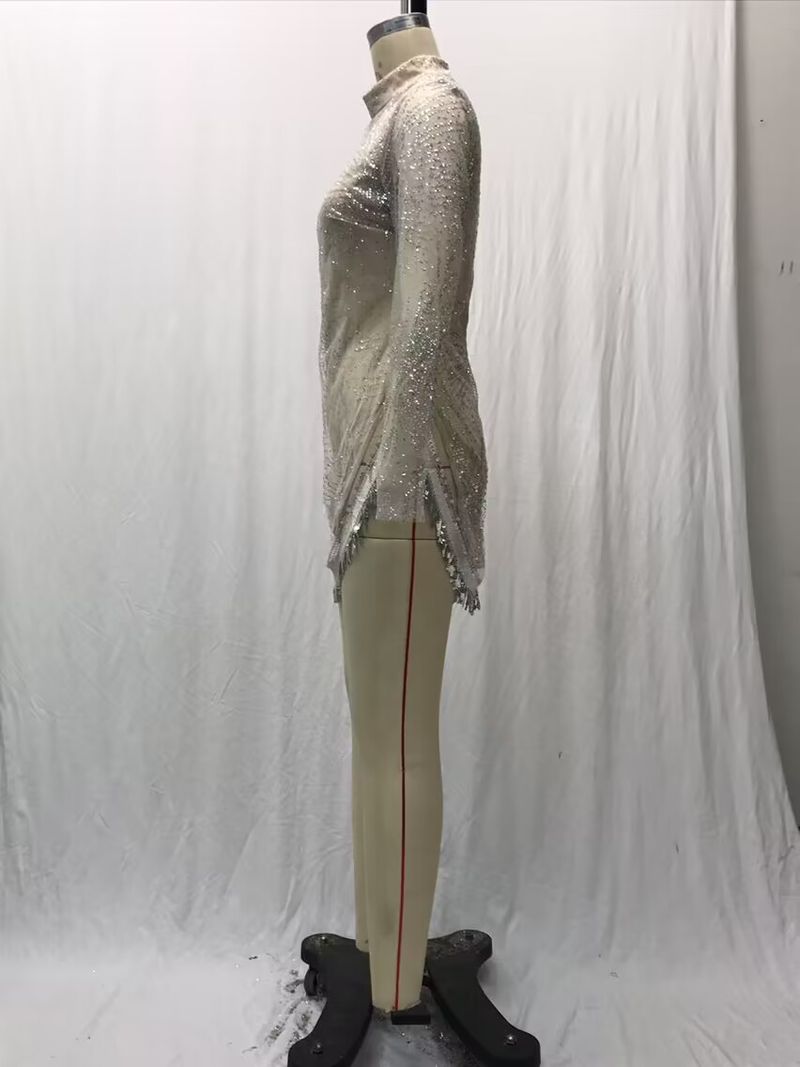 Abito da sera sexy a maniche lunghe con spacchi di nappe in oro e argento, da donna_voghion.com