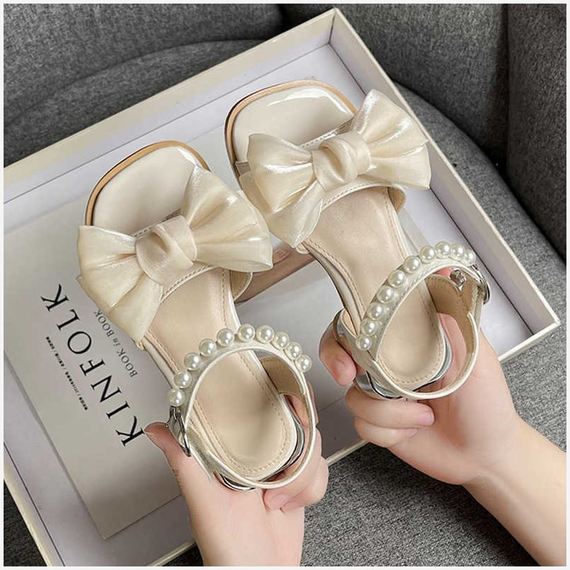 Sandali per bambini 2023 Estate nuove ragazze medie e grandi suola morbida piccolo tacco alto fiocco scarpe da principessa per ragazza_voghion.com