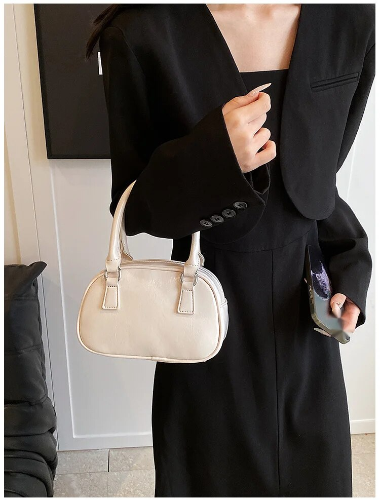 Versione coreana Texture 2024 Nuova nicchia Borsa quadrata portatile piccola Borsa a tracolla singola alla moda Borsa da bowling per donna_voghion.com