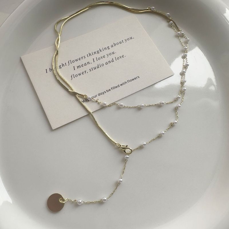 2024 nuova collana di perle finte impilabili romantiche francesi per le donne collana clavicola abbinata collana di design di nicchia gioielli_voghion.com