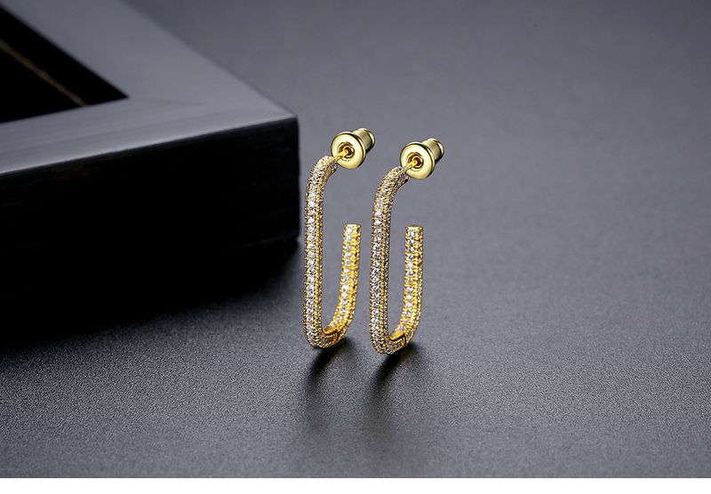 Orecchini a bottone da donna con zirconi cubici e design interamente in diamanti, clip per orecchini a forma di U placcate in oro 18 carati per un look elegante e alla moda._voghion.com