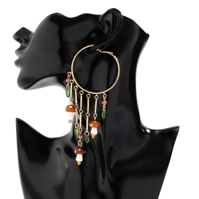 Orecchini da donna in oro, orecchini con grandi cerchi esagerati e pendenti con nappe, orecchini versatili in stile etnico a forma di foglia di fungo._voghion.com