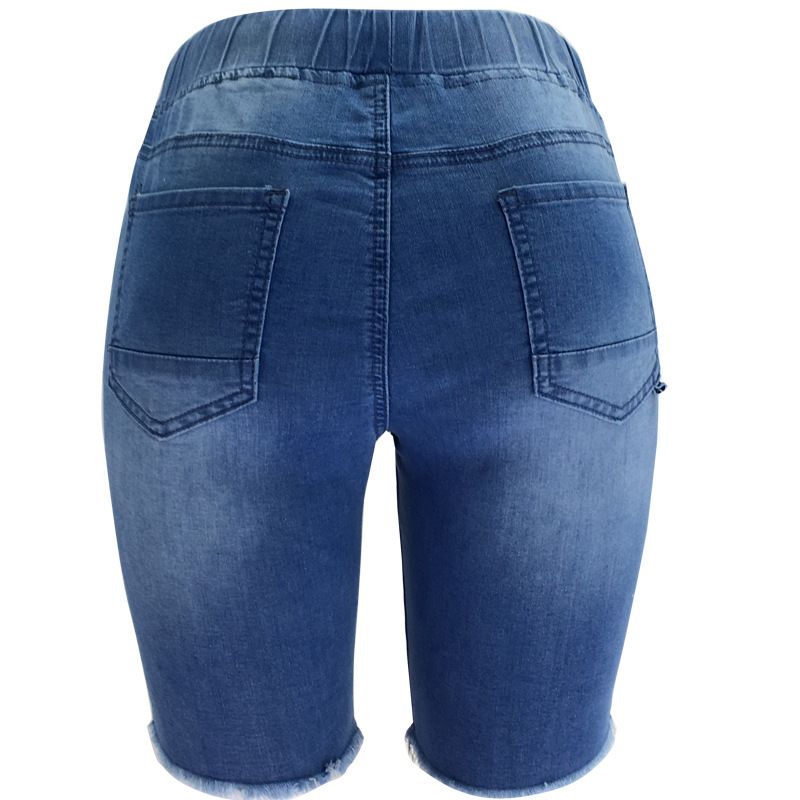 Jeans corti blu lavaggio medio elasticizzati a vita media strappati da donna_voghion.com