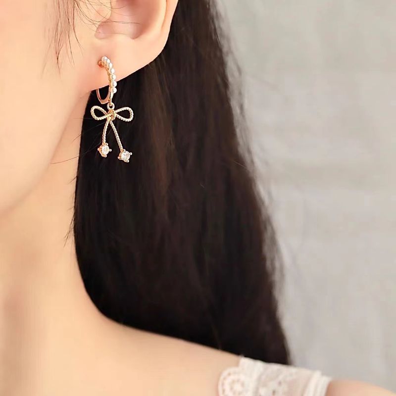 Orecchini a fiocco di perle di temperamento per le donne 2023 nuovo stile design di nicchia semplici orecchini a clip per le orecchie_voghion.com