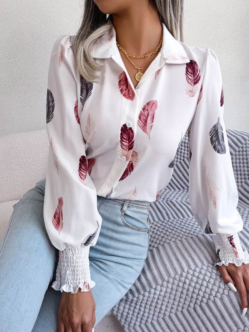 Abito da donna con camicia con risvolto e maniche a lanterna in piume di temperamento_voghion.com