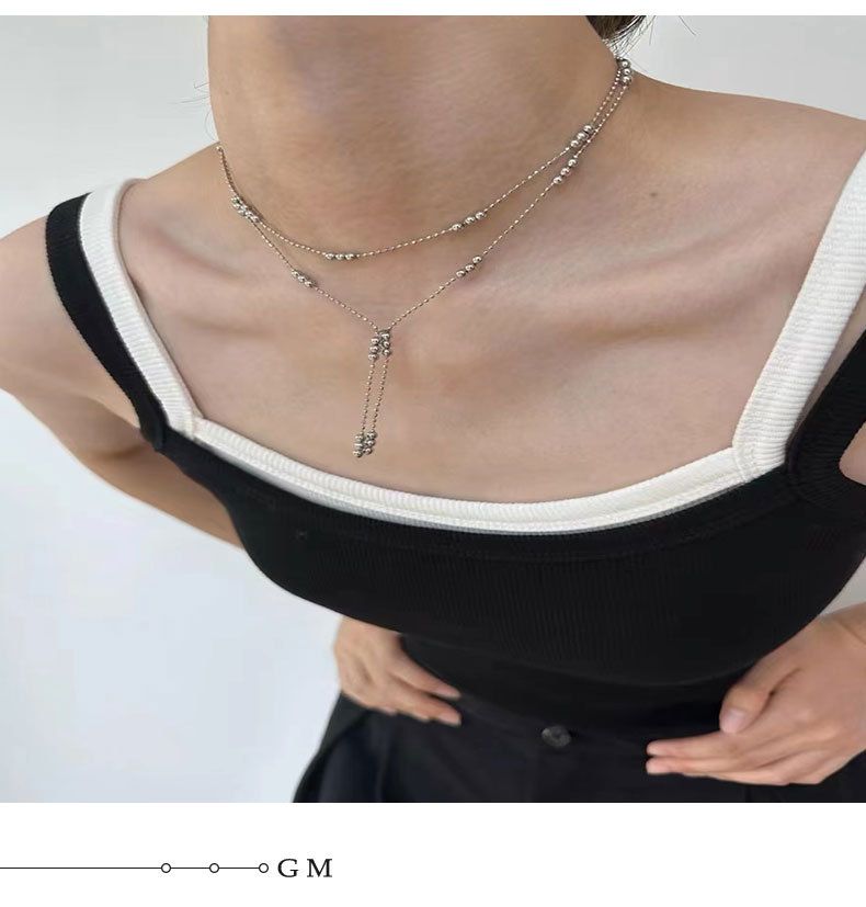 Damen-Schmuckset, modisch, silberfarben, schlichte Halskette mit silbernen Perlen und Quasten, doppellagige Abstandsperlen, gestapelte Halskette, fortschrittliches Design, Schlüsselbeinkette_voghion.com