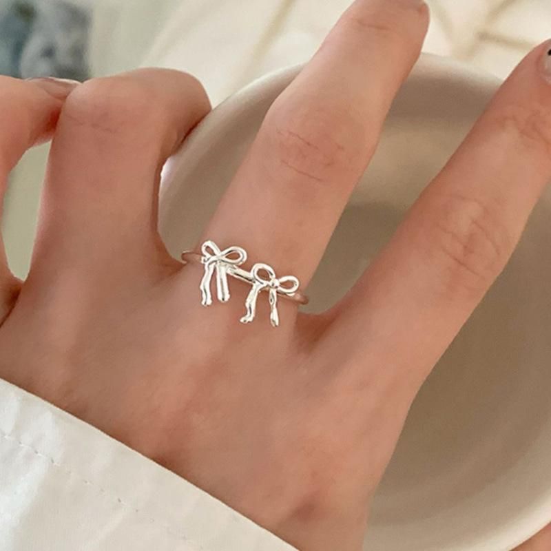 2025 New Arrivals Elegant shaped irregular women's fashionable and exquisite adjustable double bow ring, designer wedding party jewelry,_voghion.com