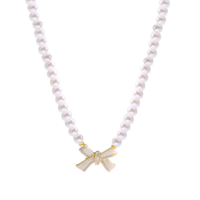 Temperament Short Clavicle Pearl Bow Necklace Net Celebrity Retro French Princess_voghion.com