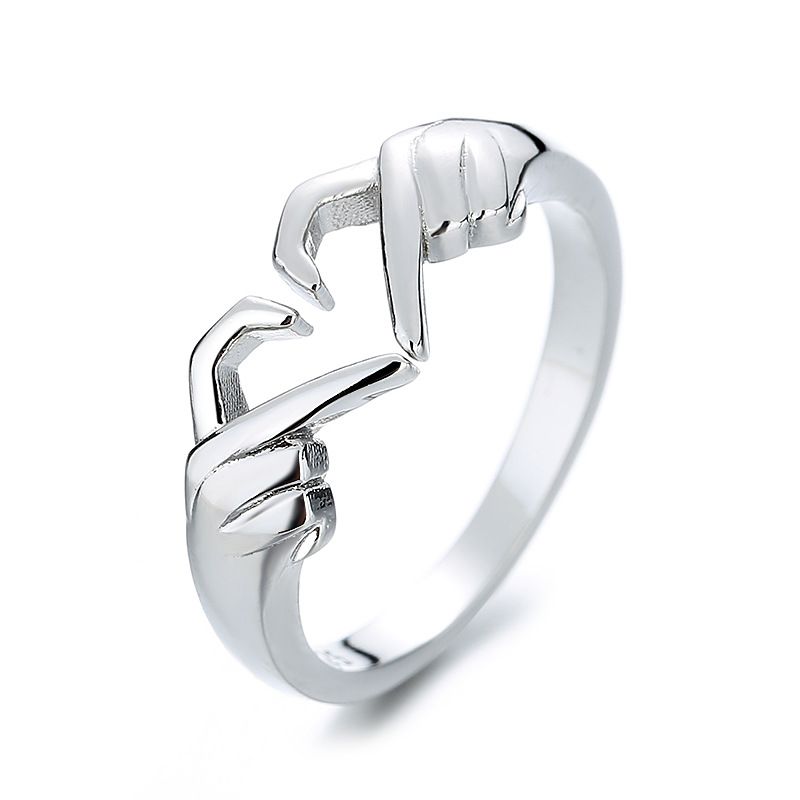 Anello di moda per coppia con gesto geometrico a forma di cuore e palma a doppia mano romantica Carlisle_voghion.com
