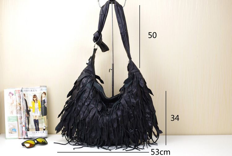 Bolso de piel nuevo para mujer, bolso hobo personalizado con borlas de rayas negras, suave y casual para mujer, bolso de hombro, bolso de piel de oveja para mujer_voghion.com