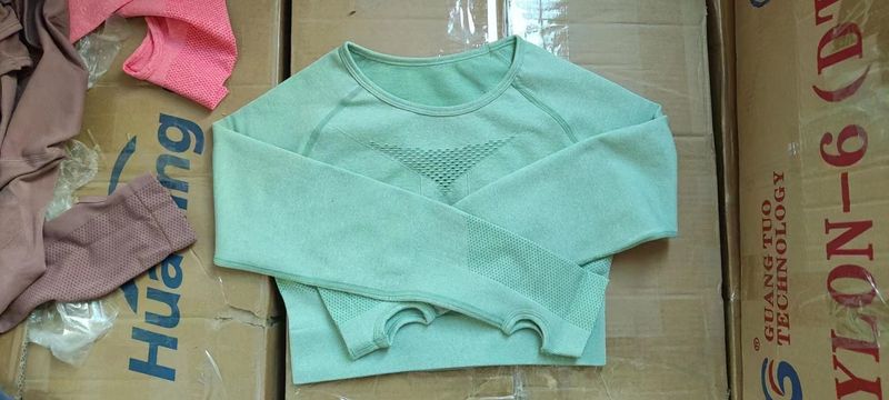 Op voorraad Europese en Amerikaanse holle yogabroeken met hoge sterkte, outdoor fitness, strakke broek met hoge taille en lange mouwen_voghion.com