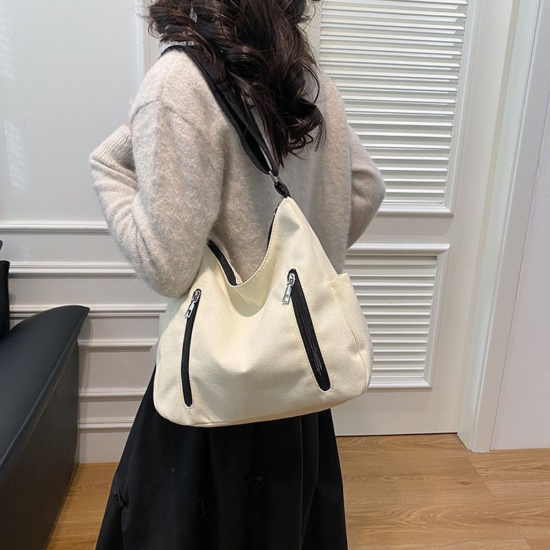 Borse alla moda di quest'anno per le donne, grande capacità, 2024, nuova borsa a tracolla versatile in tinta unita con texture a secchiello_voghion.com