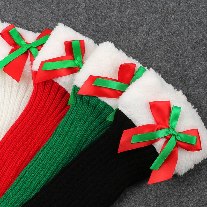 avec des chaussettes de Noël en velours pour femmes, des protections chaudes en tricot pour les jambes et les pieds, des chaussettes poilues à nœud papillon_voghion.com