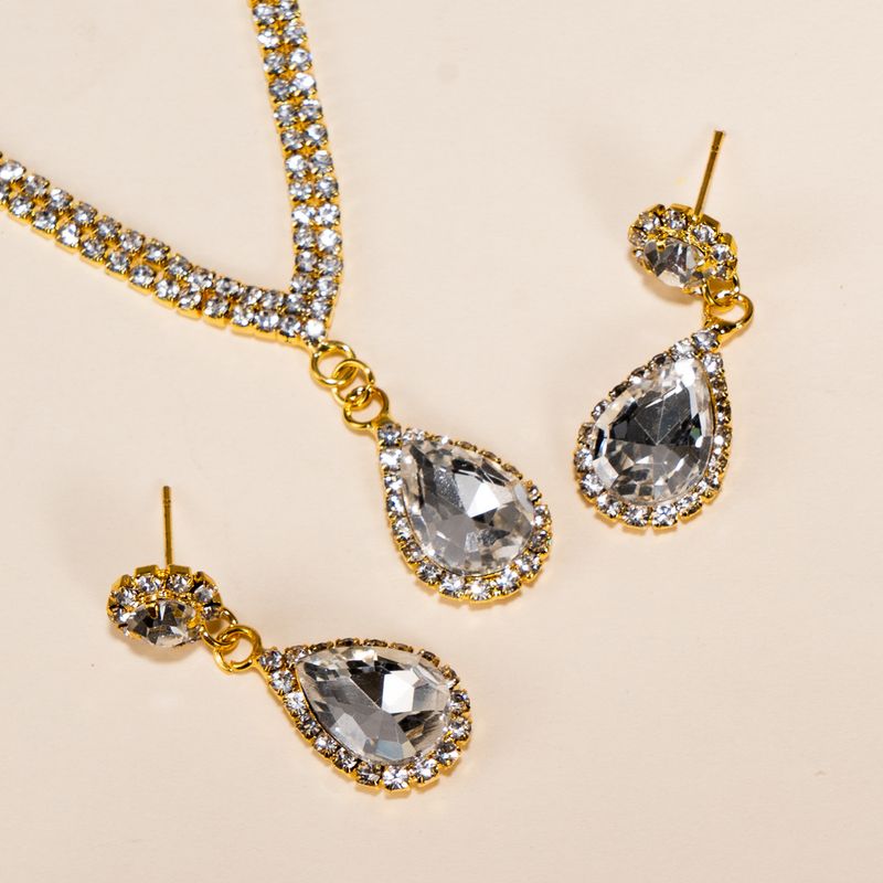 Set di gioielli da donna, elegante collana con strass a goccia, orecchini e bracciale, per matrimoni, feste e serate di lusso, set di collana, orecchini e bracciale con borsa_voghion.com