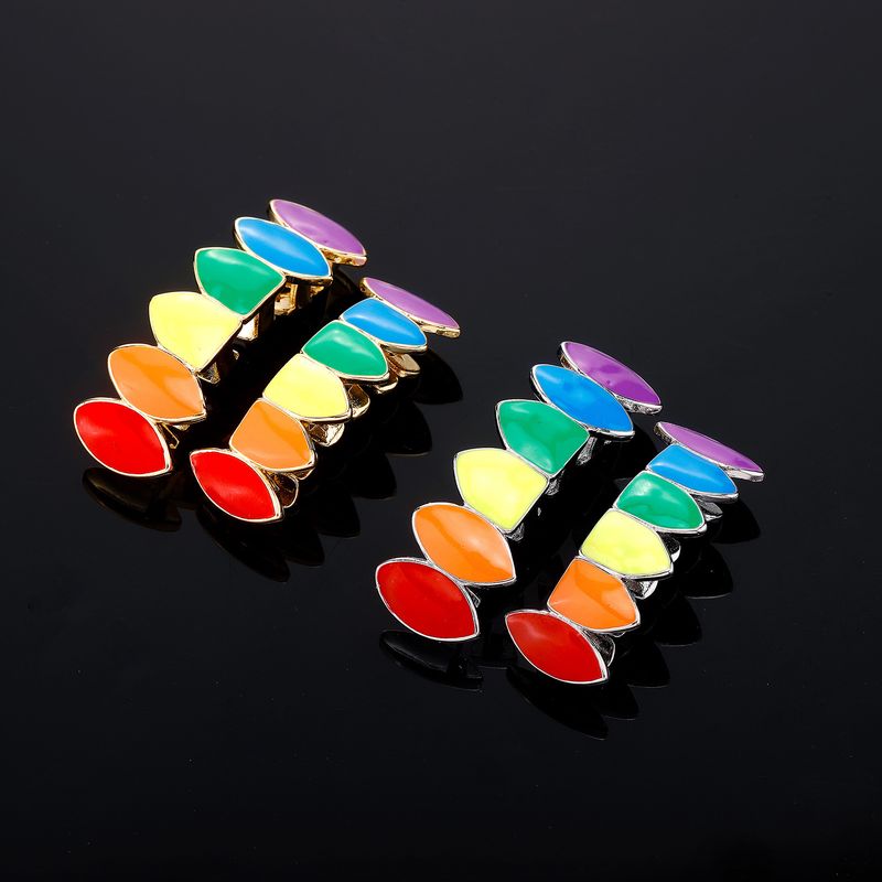 Grillz Hip Hop in oro per uomo e donna - Griglie per denti affilati placcate in oro di alta qualità per Halloween e feste - Zanne dentali colorate e luminose, eleganti e alla moda_voghion.com