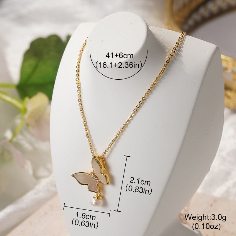 Collana elegante e versatile da donna, con ciondolo a forma di farfalla, in stile retrò francese, con zirconi intarsiati e fiore a quattro foglie._voghion.com
