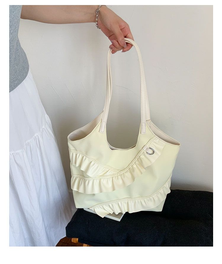 Borse alla moda di quest'anno 2025 Nuova versione coreana Moda Foglia di loto Versatile Spalla Donna Grande capacità Portatile_voghion.com
