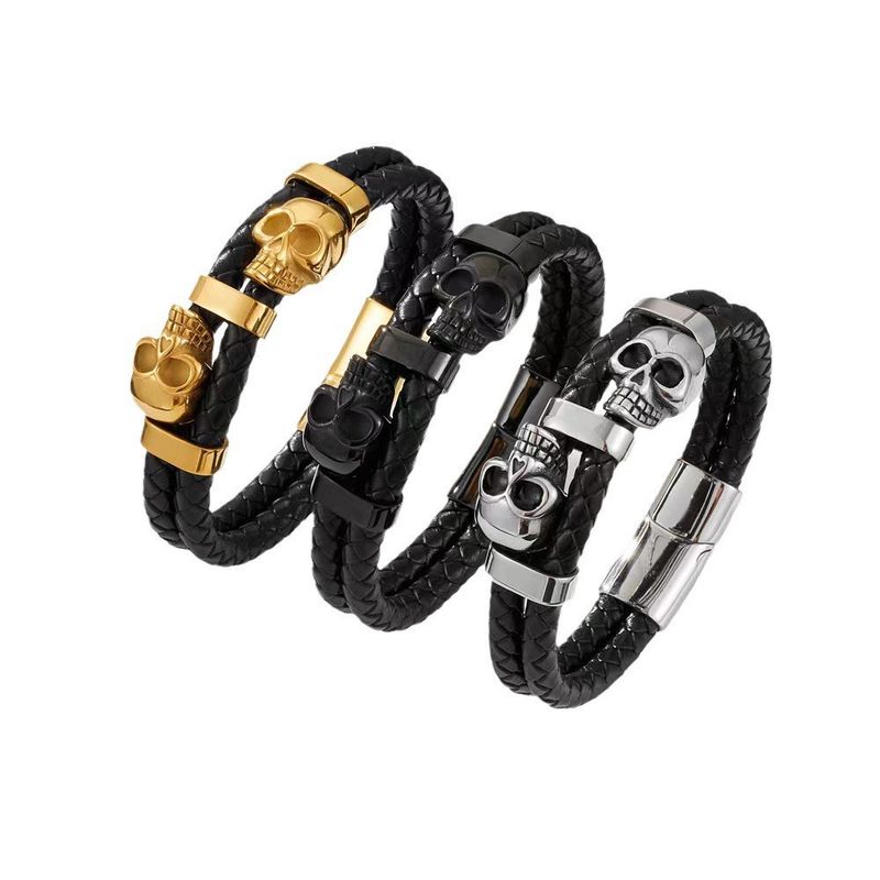 Bracciale da uomo in pelle intrecciata, stile punk scuro, fatto a mano, con teschio_voghion.com