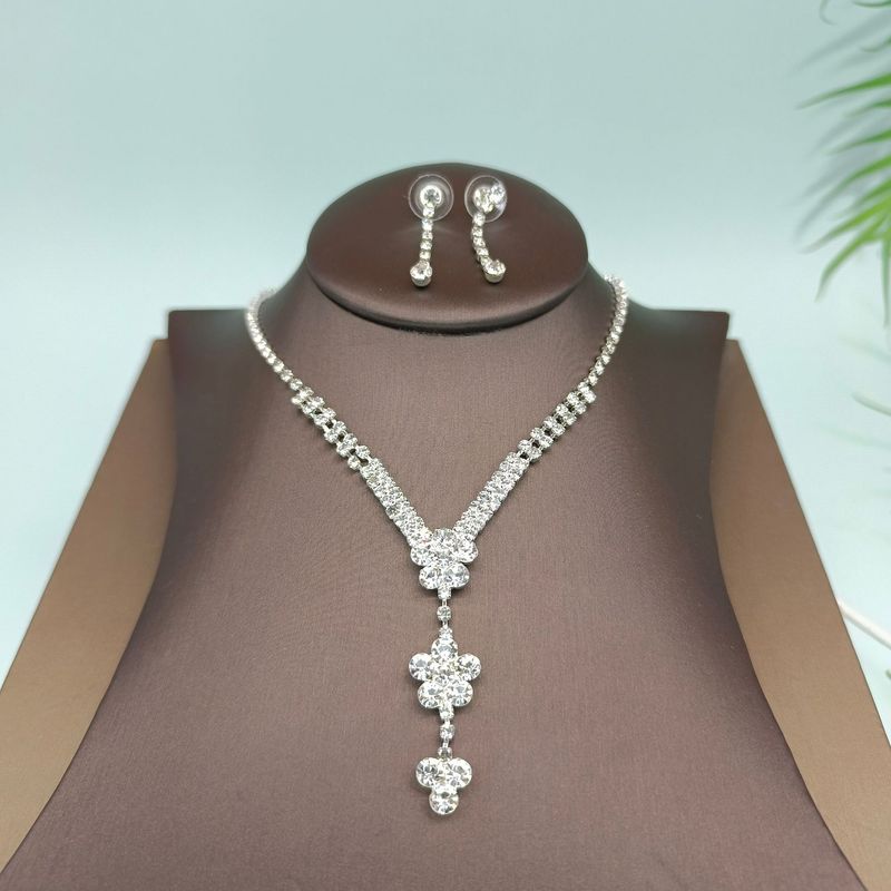 Set di gioielli da donna con collana di cristallo con catena a forma di artiglio e diamanti_voghion.com