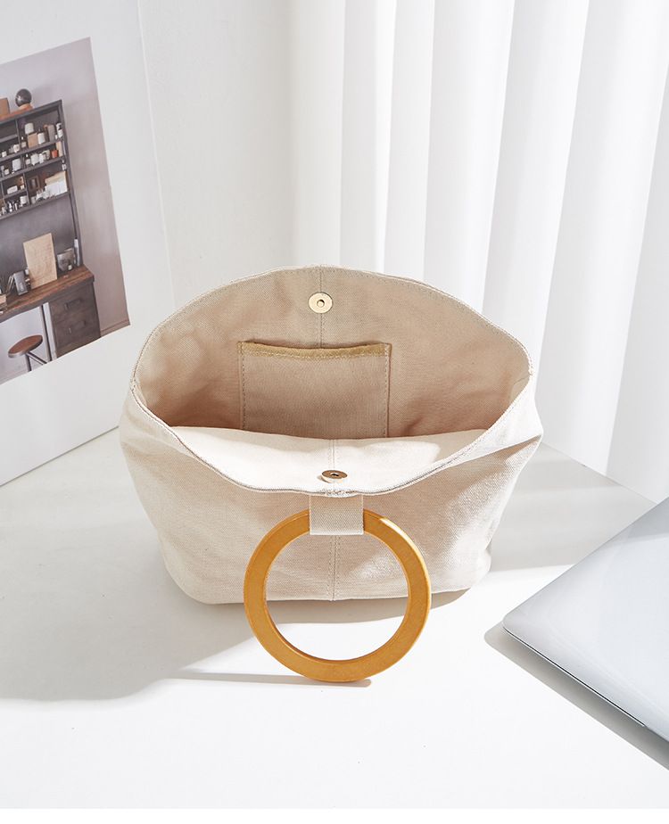 Borsa versatile e di grande capienza in versione coreana, la nuova borsa da donna minimalista in tela di quest'anno, manico in legno_voghion.com