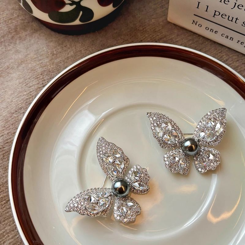 Shijia Tahitiaanse zwarte parel vlinder broche dames pak trui accessoires pin niche ontwerp licht luxe high-end_voghion.com
