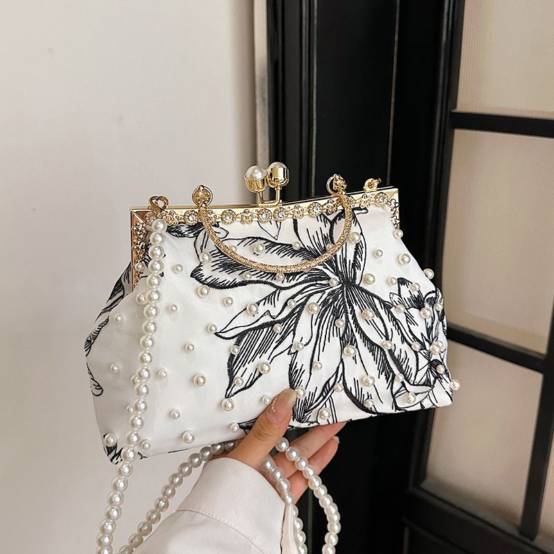 2025 Neue Mode Exquisite Abend Nationalen Stil Künstlerische Crossbody High-end Clip Handheld Shell Tasche_voghion.com