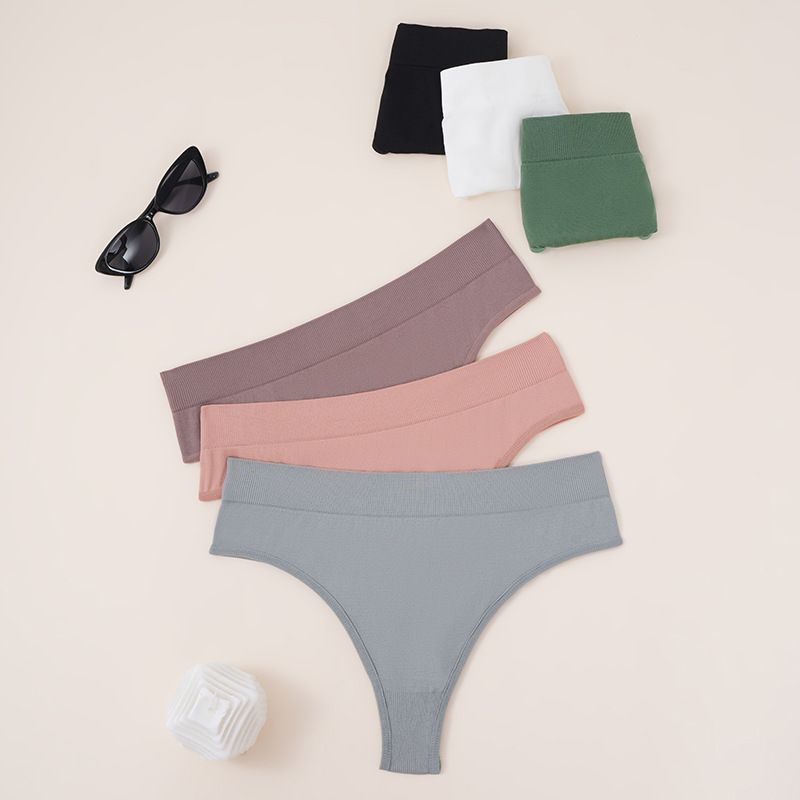 2025d Ice Silk Seamless Sexy Women's Thong Solid Color Sports Breathable Mid-Waist Pure Desire Panties For Women_voghion.com