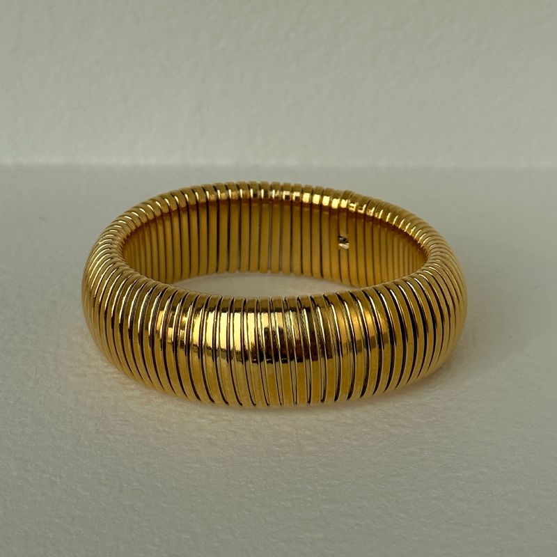 Bracciale Gypsy elastico in acciaio al titanio placcato oro vero_voghion.com