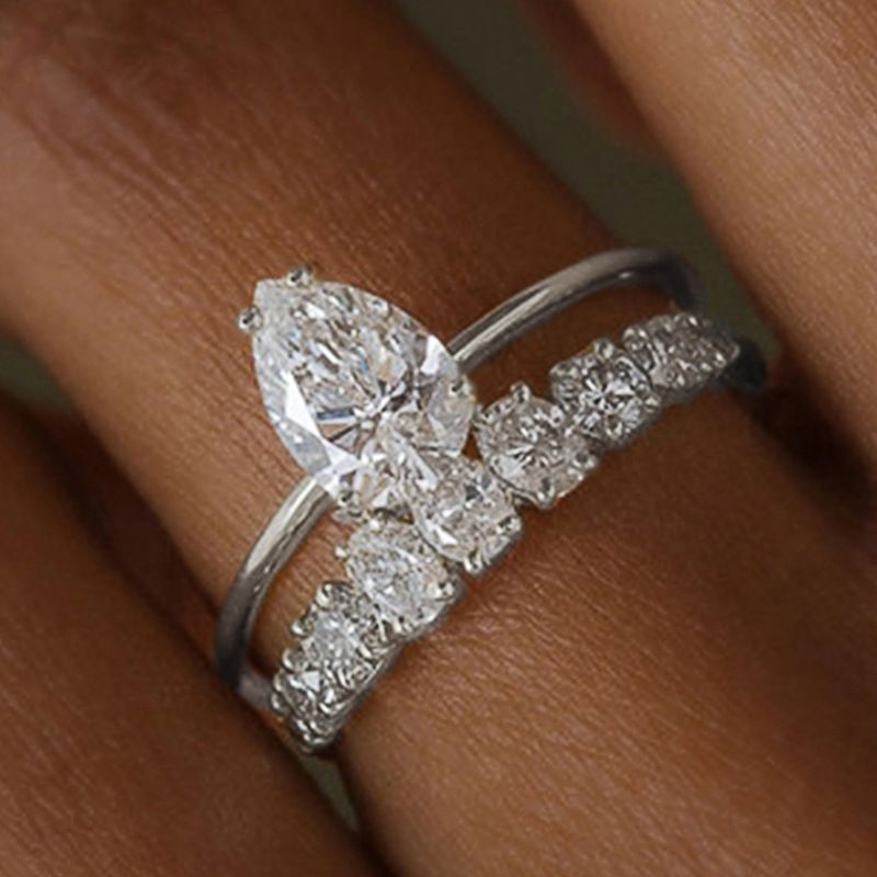 L'anello in zircone a forma di lacrima di Cao Shi è alla moda e squisito, adatto per anelli di fidanzamento e anelli popolari._voghion.com