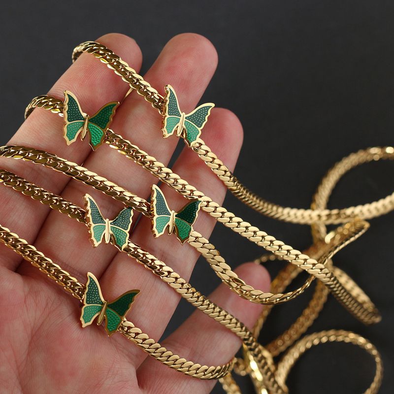 Collana girocollo a farfalla verde con catena cubana in acciaio al titanio placcato oro, resistente alla luce_voghion.com