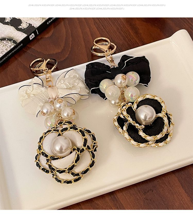 Versione coreana Candy Zhushan Camelia Fiocco in tessuto fatto a mano Portachiavi per auto Ciondolo per borsa Piccolo regalo_voghion.com